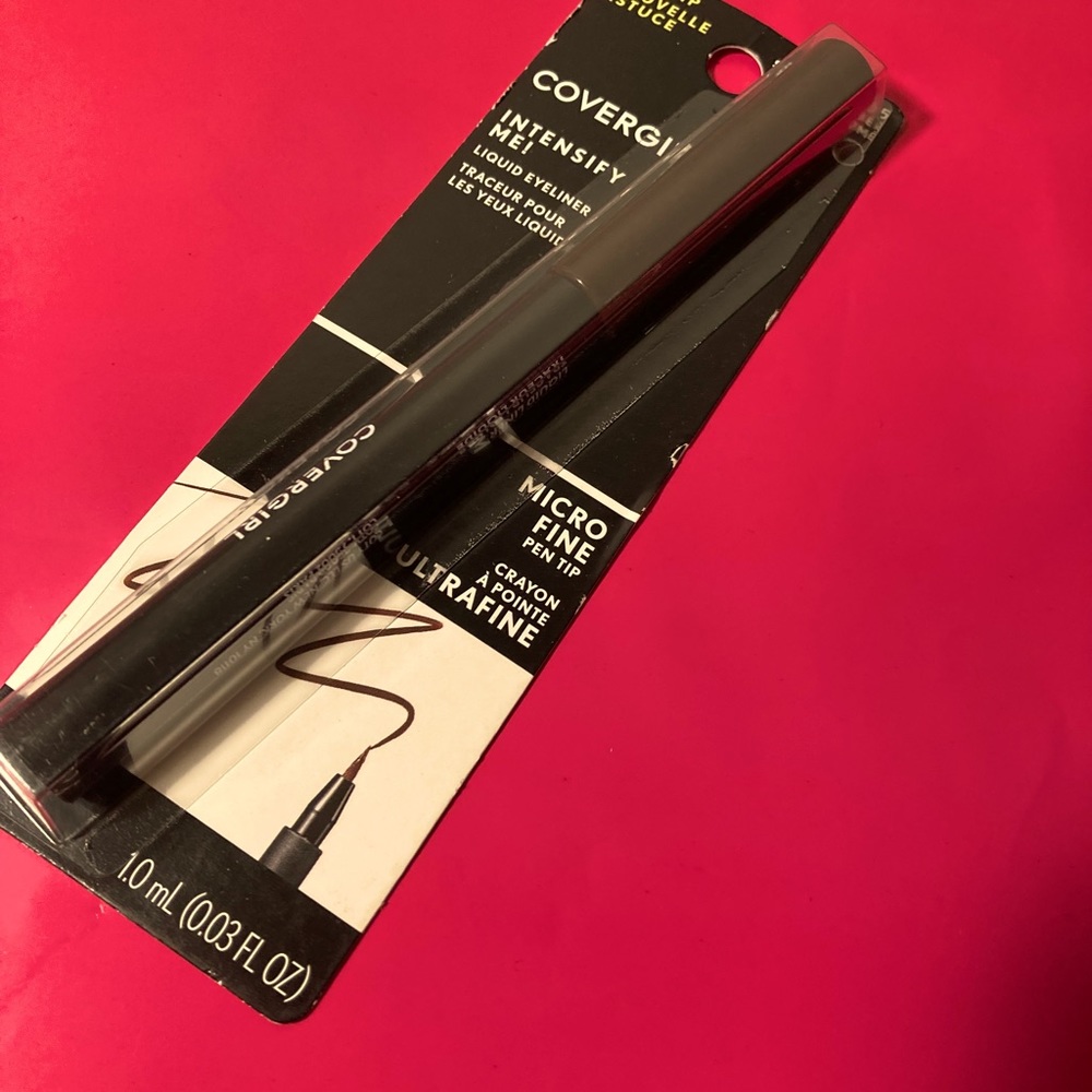 CoverGirl micro fine tip liquid eyeliner in smoked amber color.